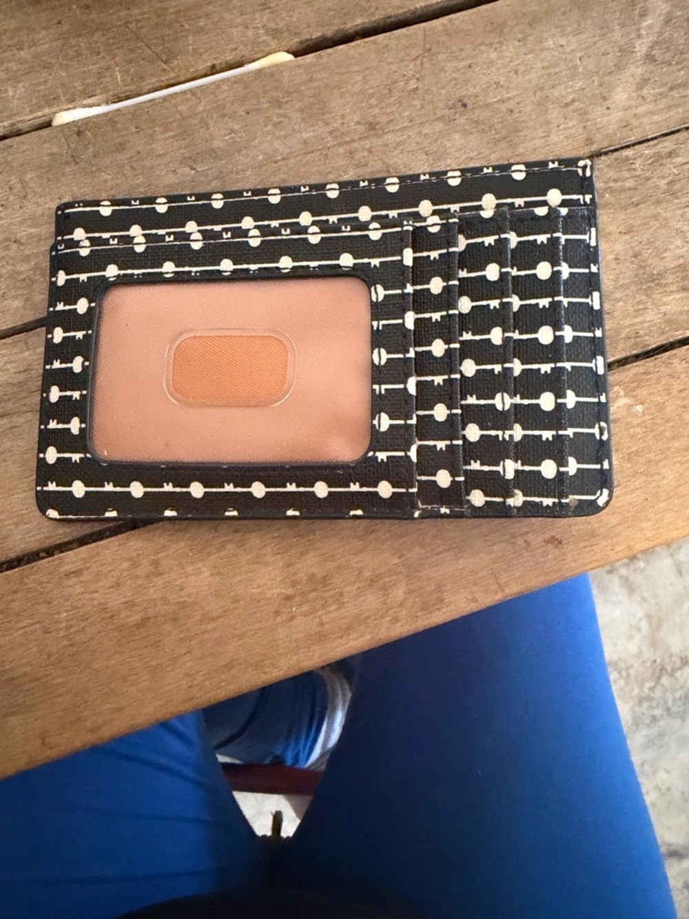 Black and Cream fossil wallet